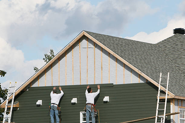Professional Storm Damage Siding Repair technician working in Cape Charles, VA